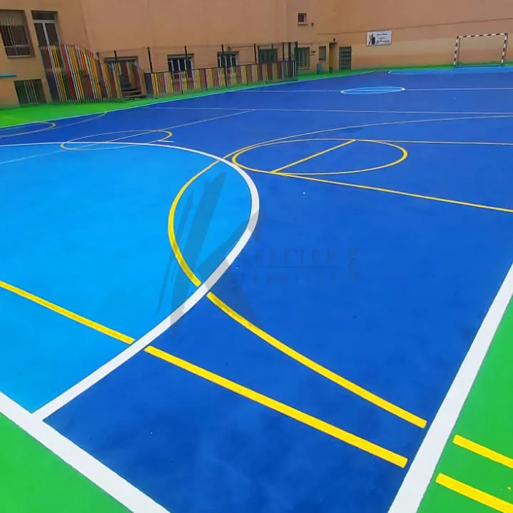 Yellow and white lines on the blue school court