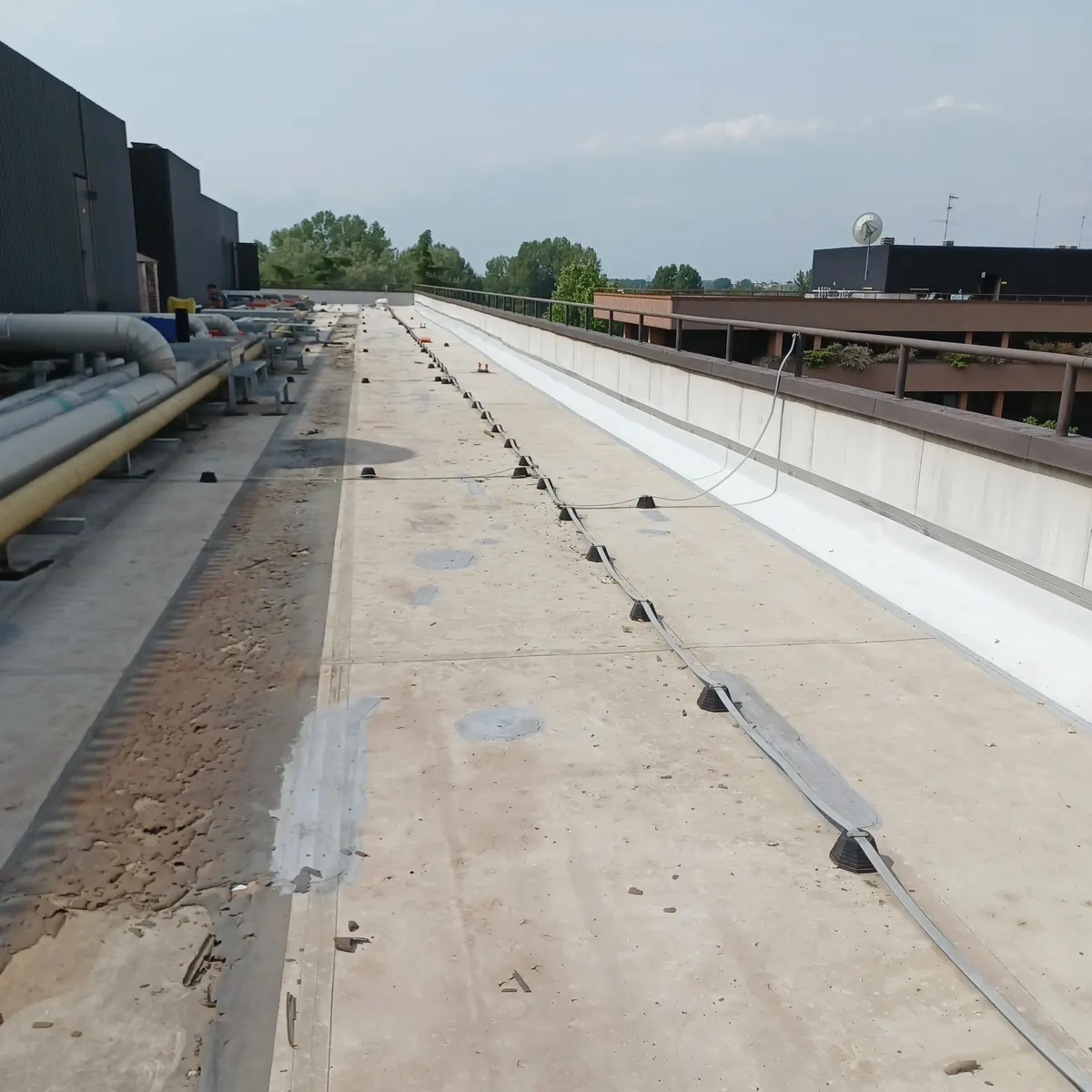 Extended view of prepared bank roof field, Milan