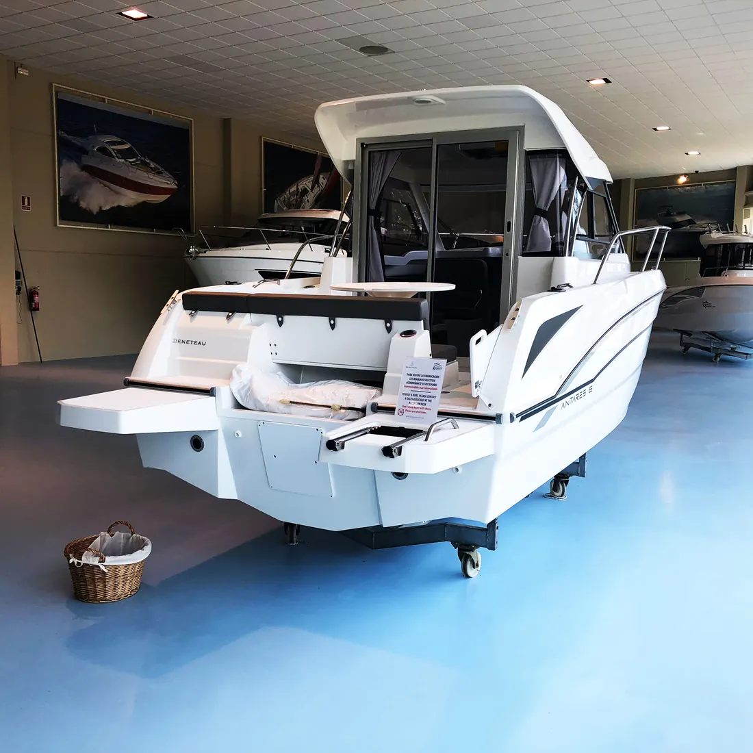 A boat stern on the pale blue floor A boat stern on the pale blue floor