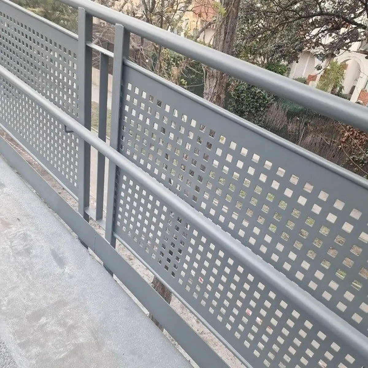Grey anticorrosion coat on railing panels and posts, Castelldefels