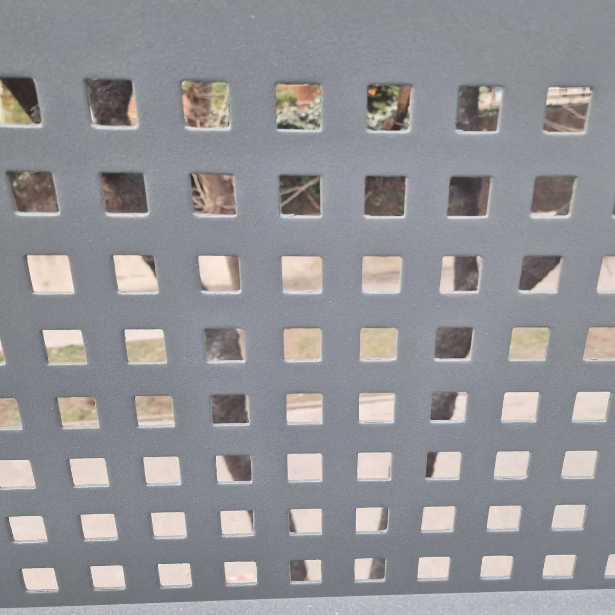 Close view of a coated perforated steel panel, Castelldefels