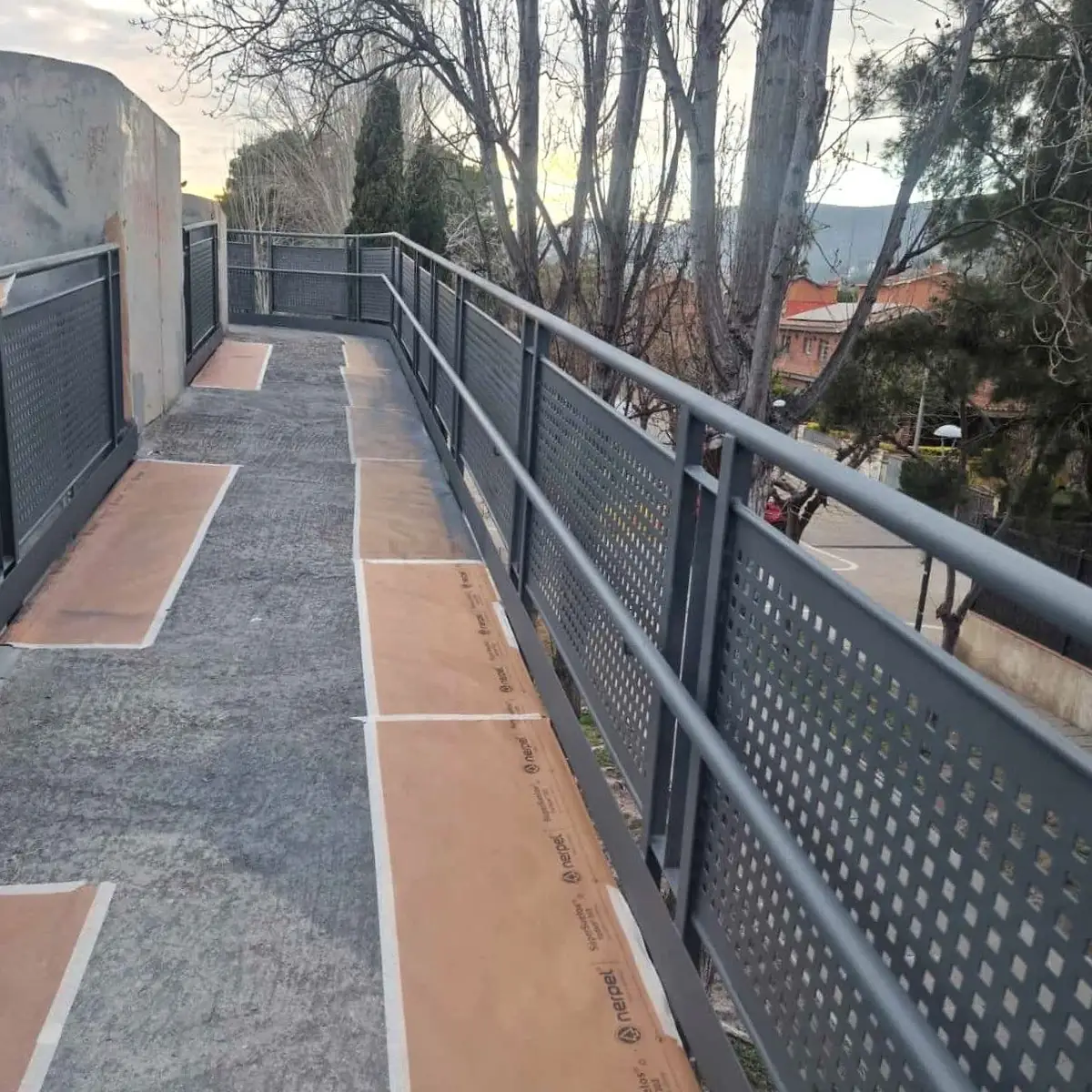 Bridge access ramp with coated railings, Castelldefels