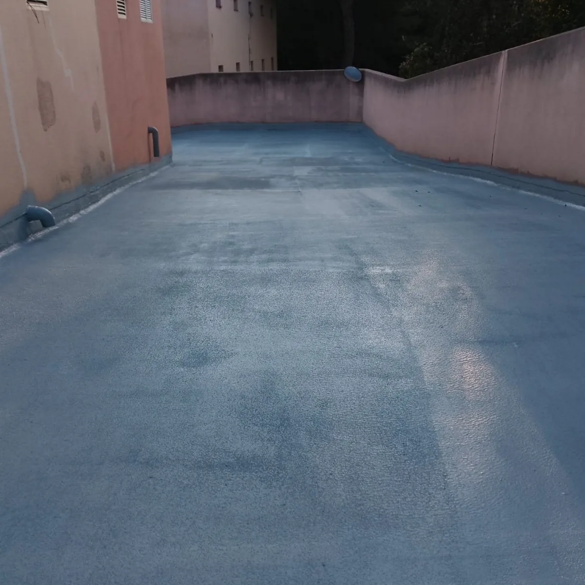 Primed concrete ramp between walls on the car park roof, Mallorca