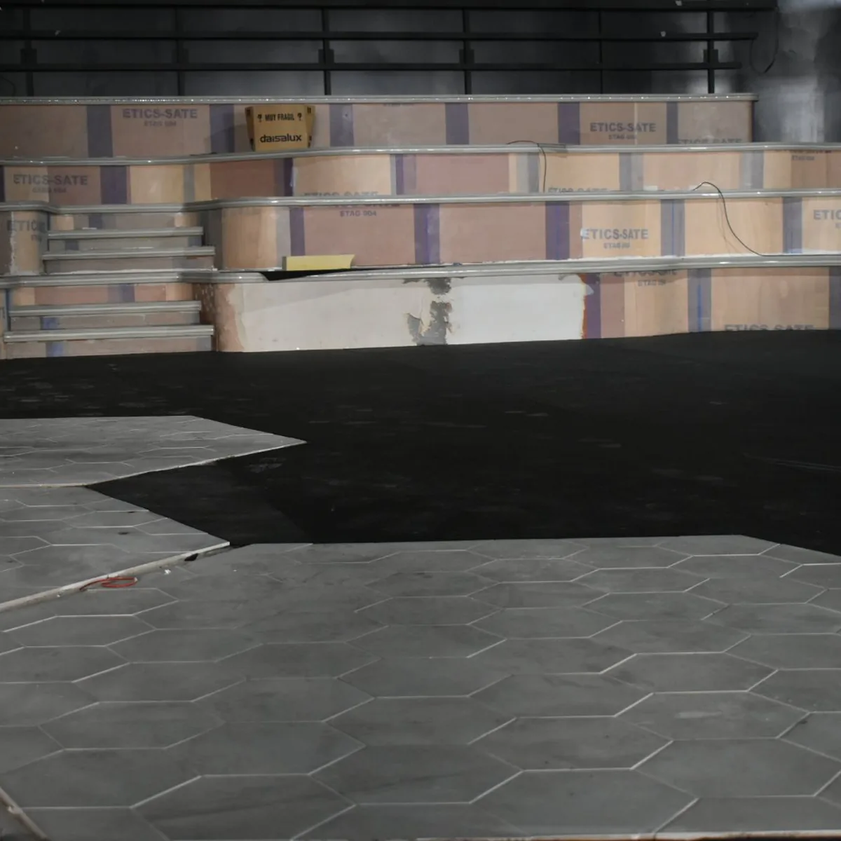 Floor panels by the tiered seating during works, Salou