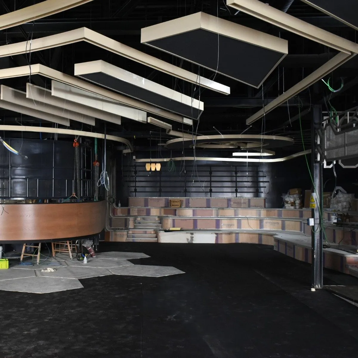 Rubber mat panels being laid in the venue hall, Salou