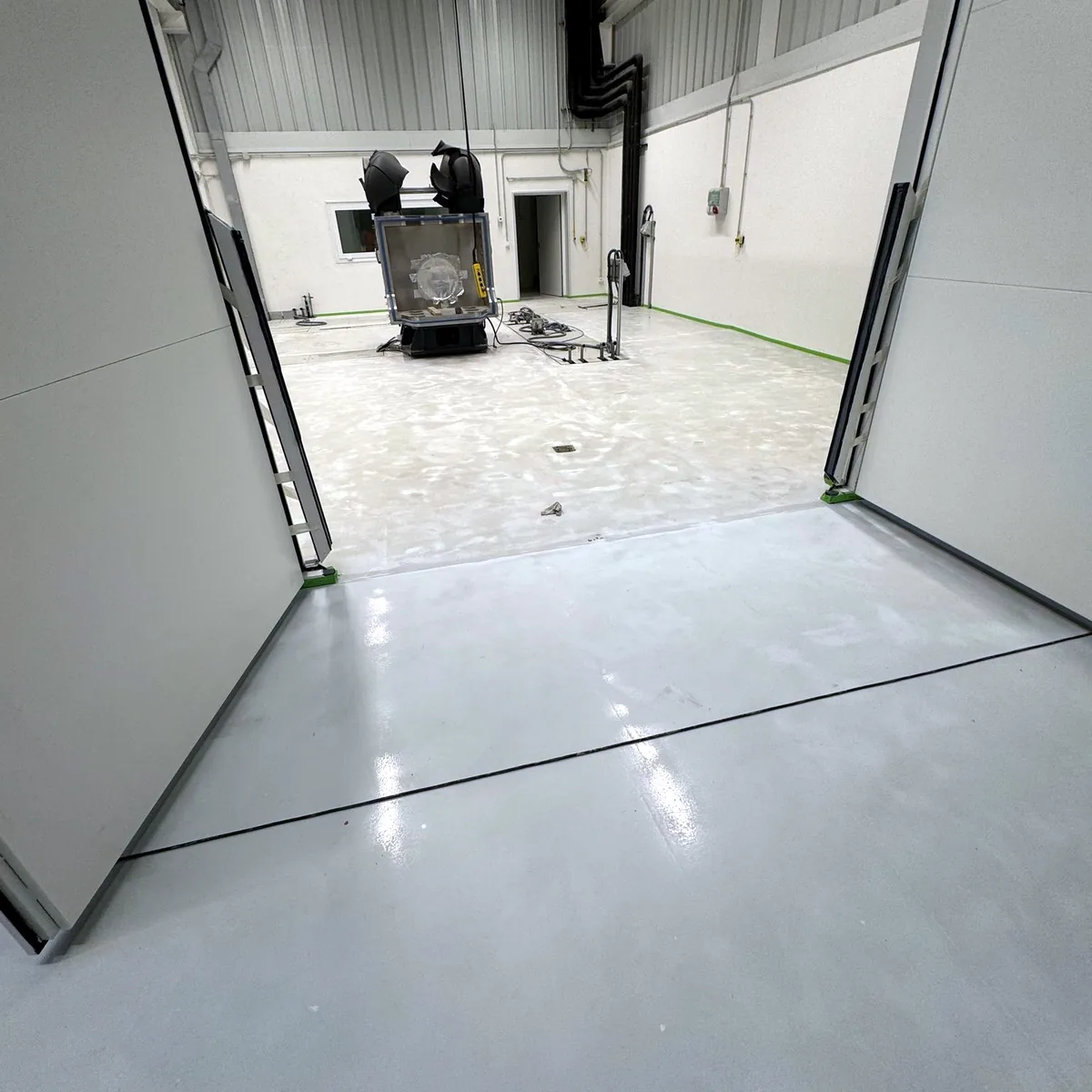 View through a wide doorway onto the new floor