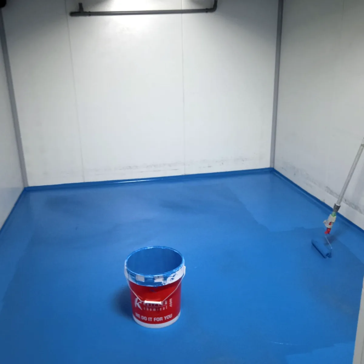 Blue coat running up to the white wall base Blue coat running up to the white wall base
