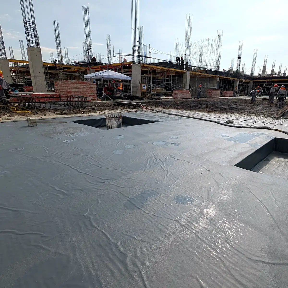 Grey membrane wrapped into slab openings at Real Plaza Piura, Peru