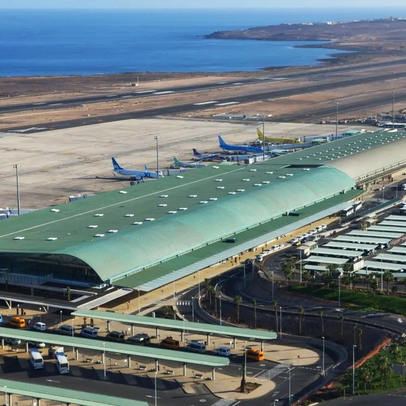 Fuerteventura Airport from the air, with the terminal and the flat roofs beside the runway
