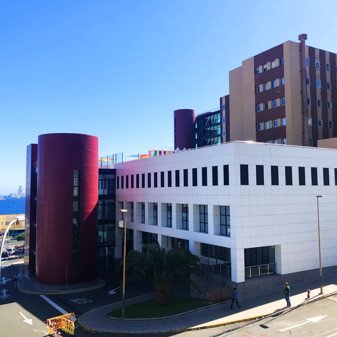 The white hospital building by the sea