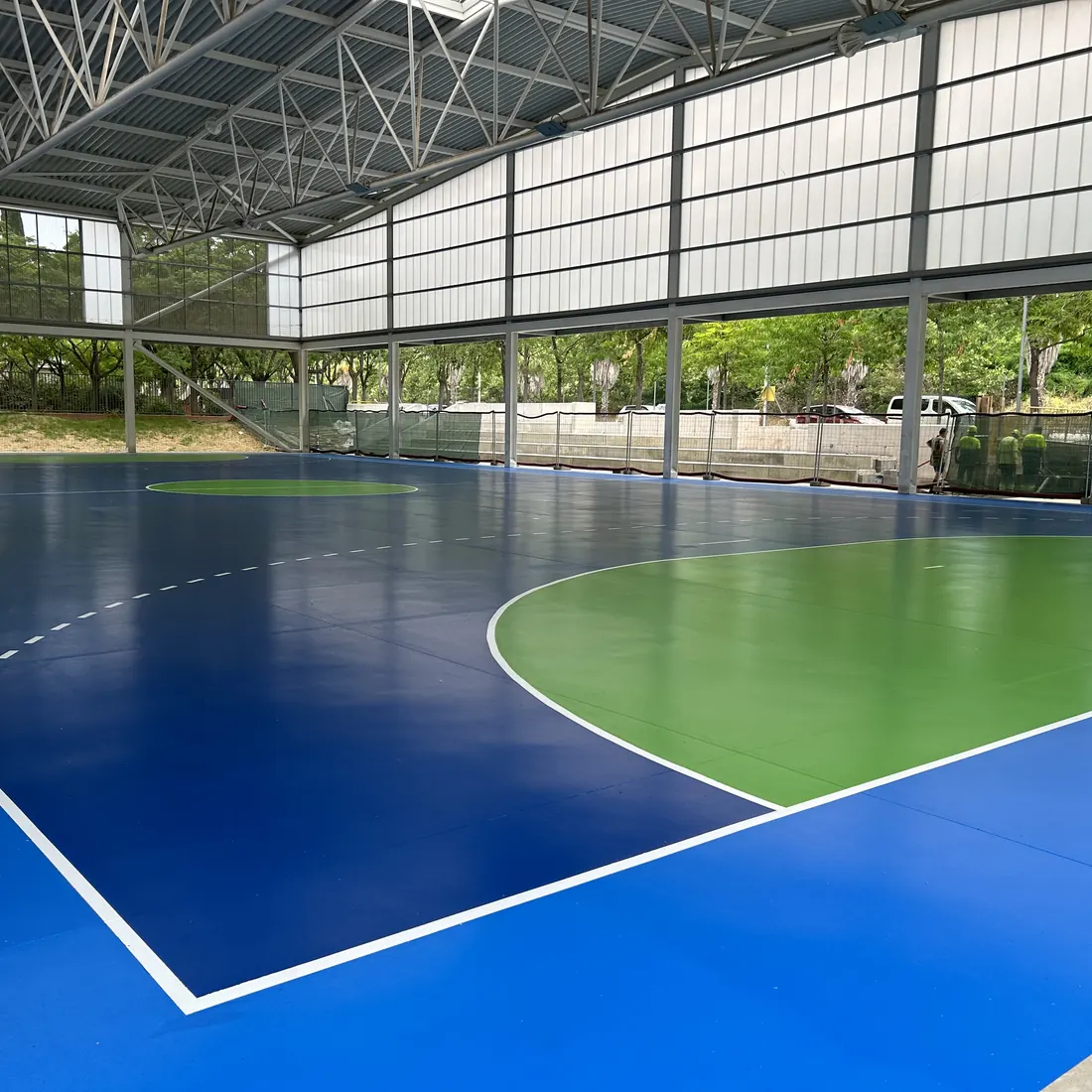 Blue and green sports floor in the Granollers hall Blue and green sports floor in the Granollers hall