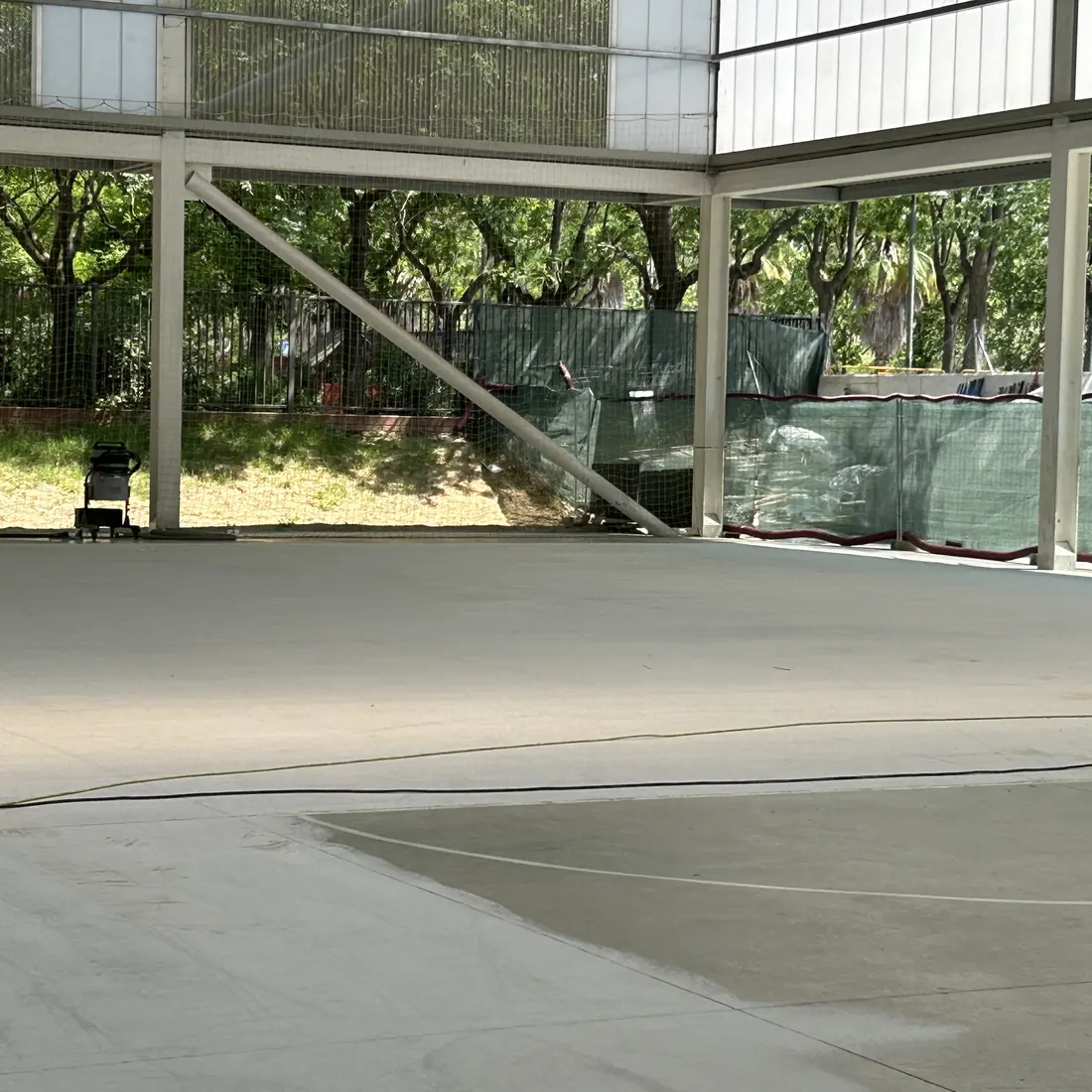 The green floor beside the glazed side of the hall The green floor beside the glazed side of the hall