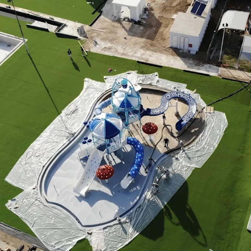 The play pool from above, with plastic sheeting still on the surround The play pool from above, with plastic sheeting still on the surround