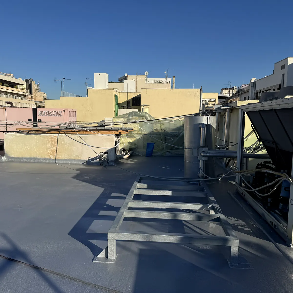 Roof membrane detailed around HVAC plant, Athens embassy