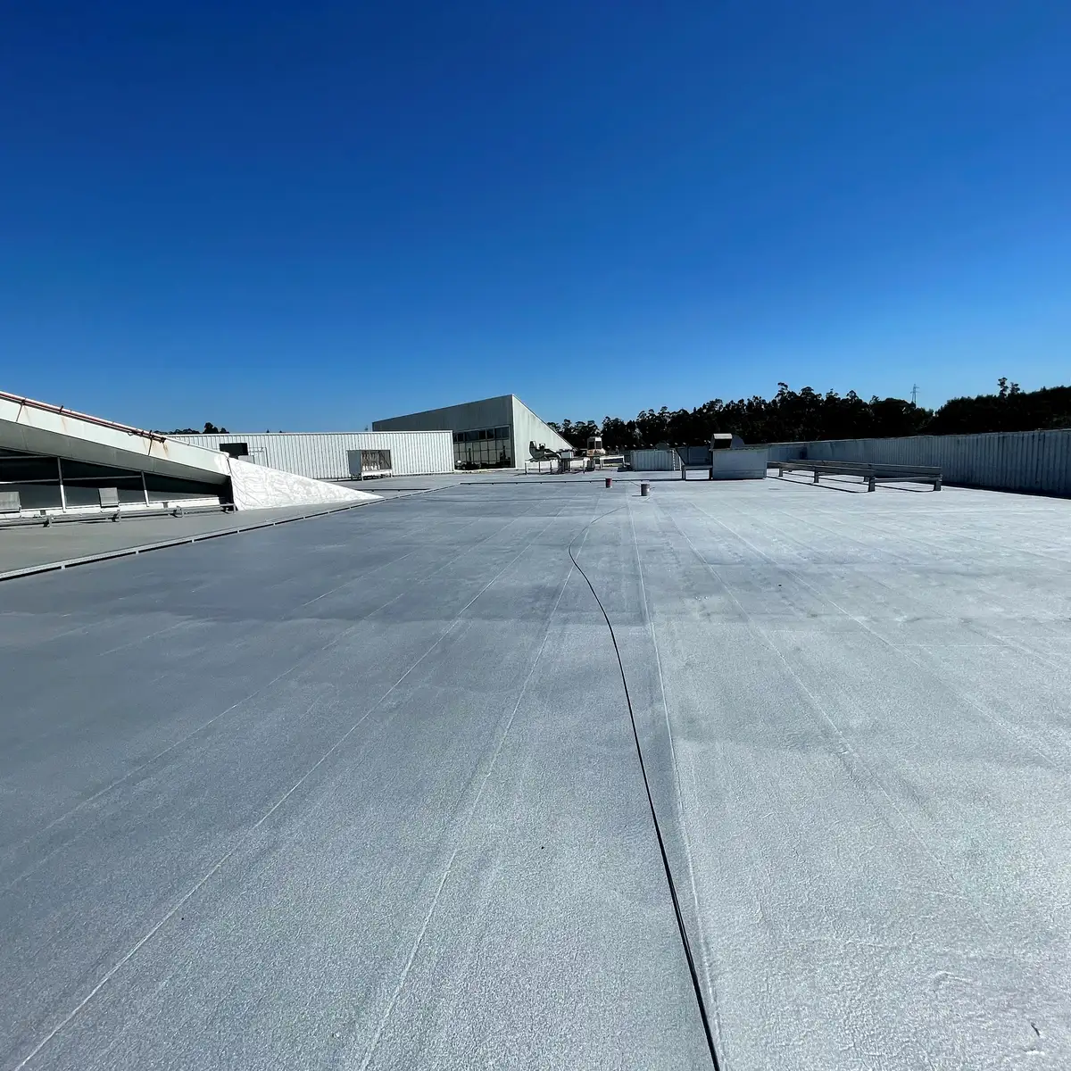 Shopping centre roof mid-works under sun, Paços de Ferreira Shopping centre roof mid-works under sun, Paços de Ferreira