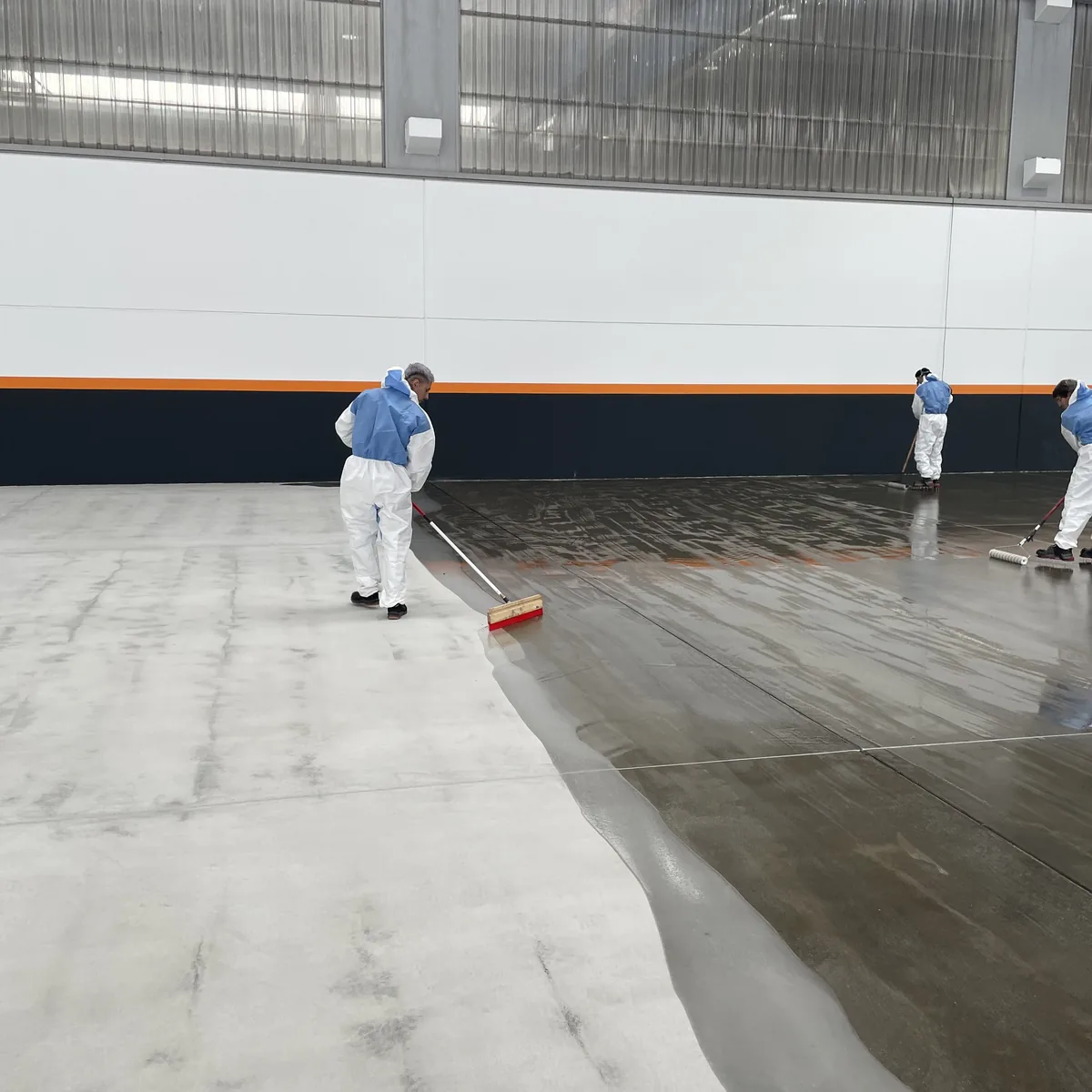 Second coat of EP Coat 100 being spread over the first, A Coruña factory Second coat of EP Coat 100 being spread over the first, A Coruña factory