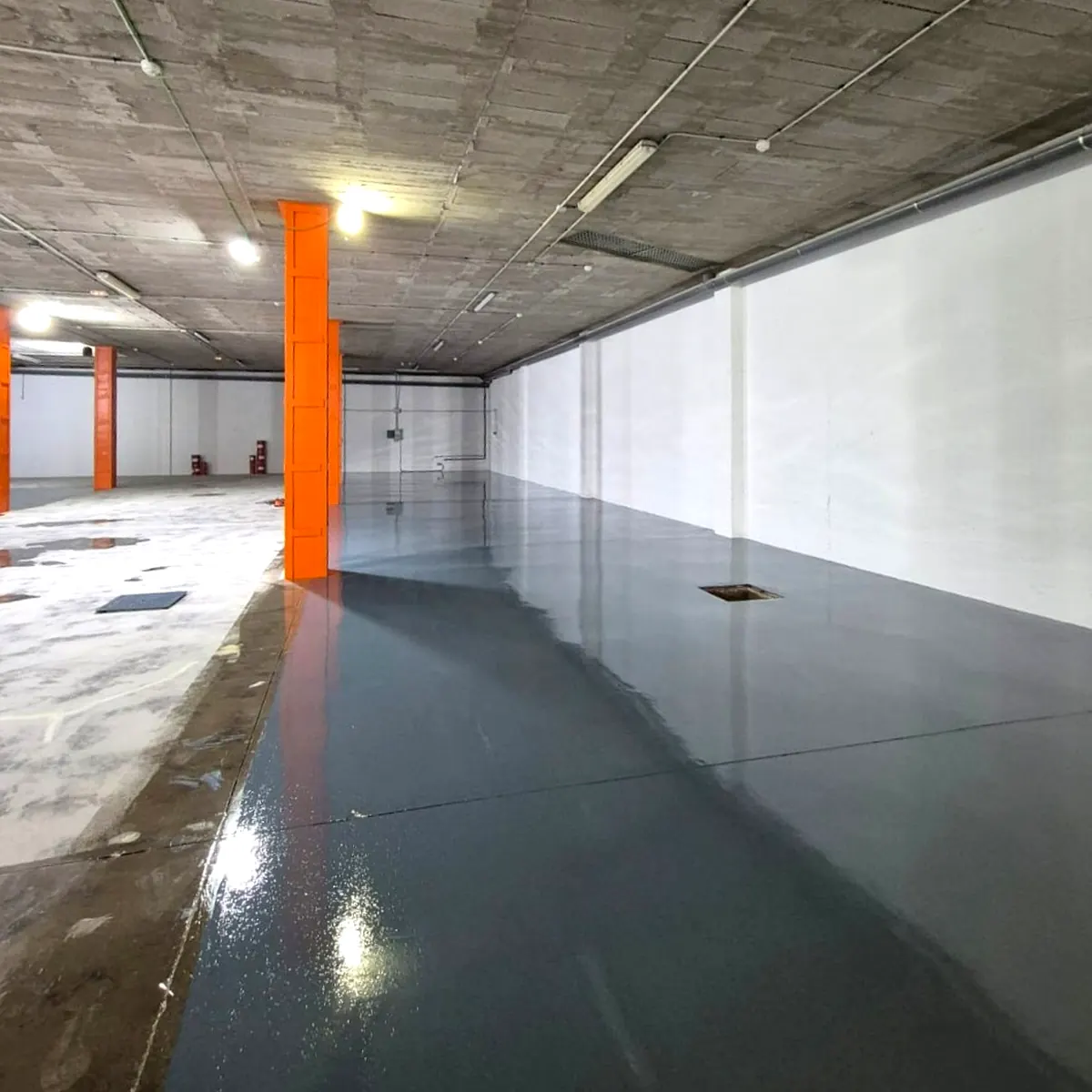 Wet resin edge during parking floor application, Palma Wet resin edge during parking floor application, Palma