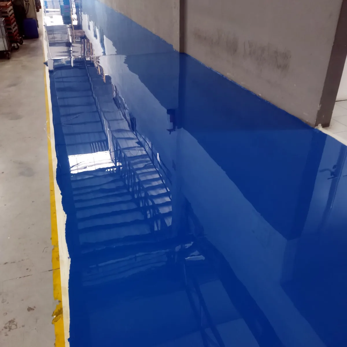 Blue coat running the full length of the wall