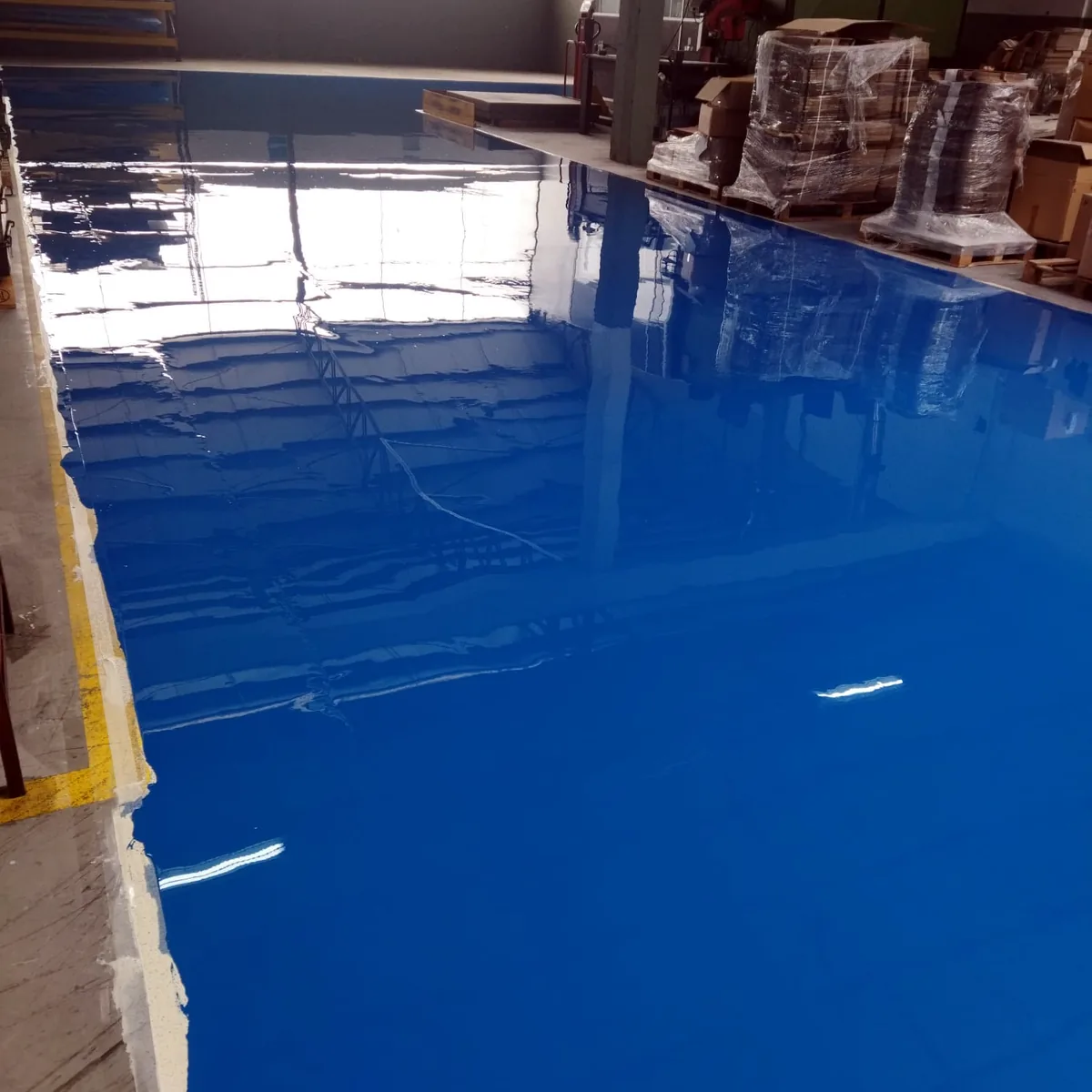 Glossy blue lane running along the storage area
