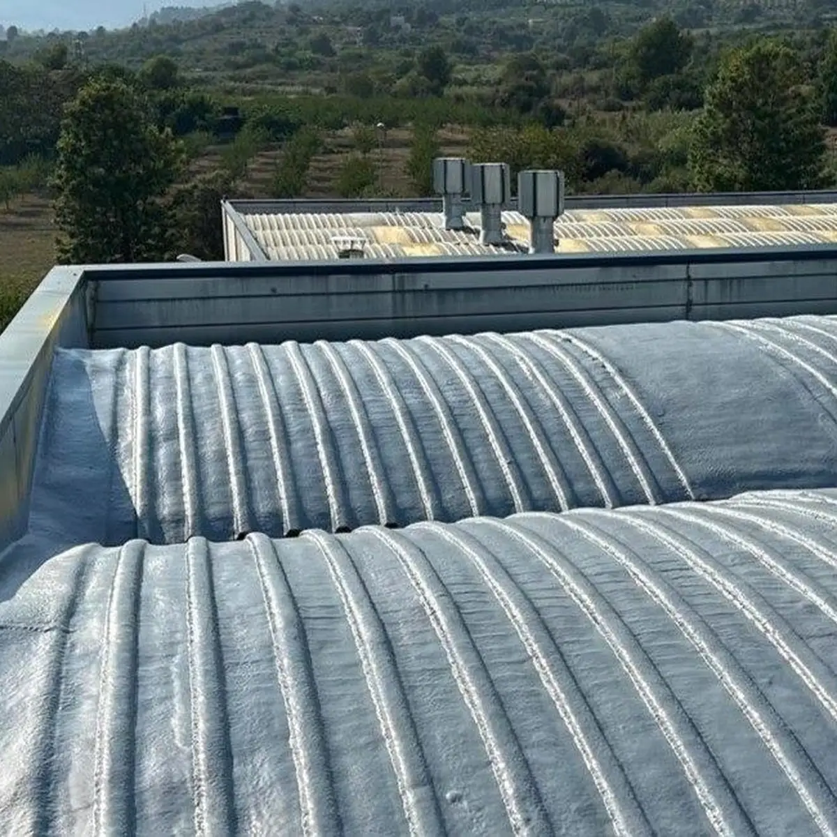 Finished grey roof ribs with the landscape behind, Tarragona