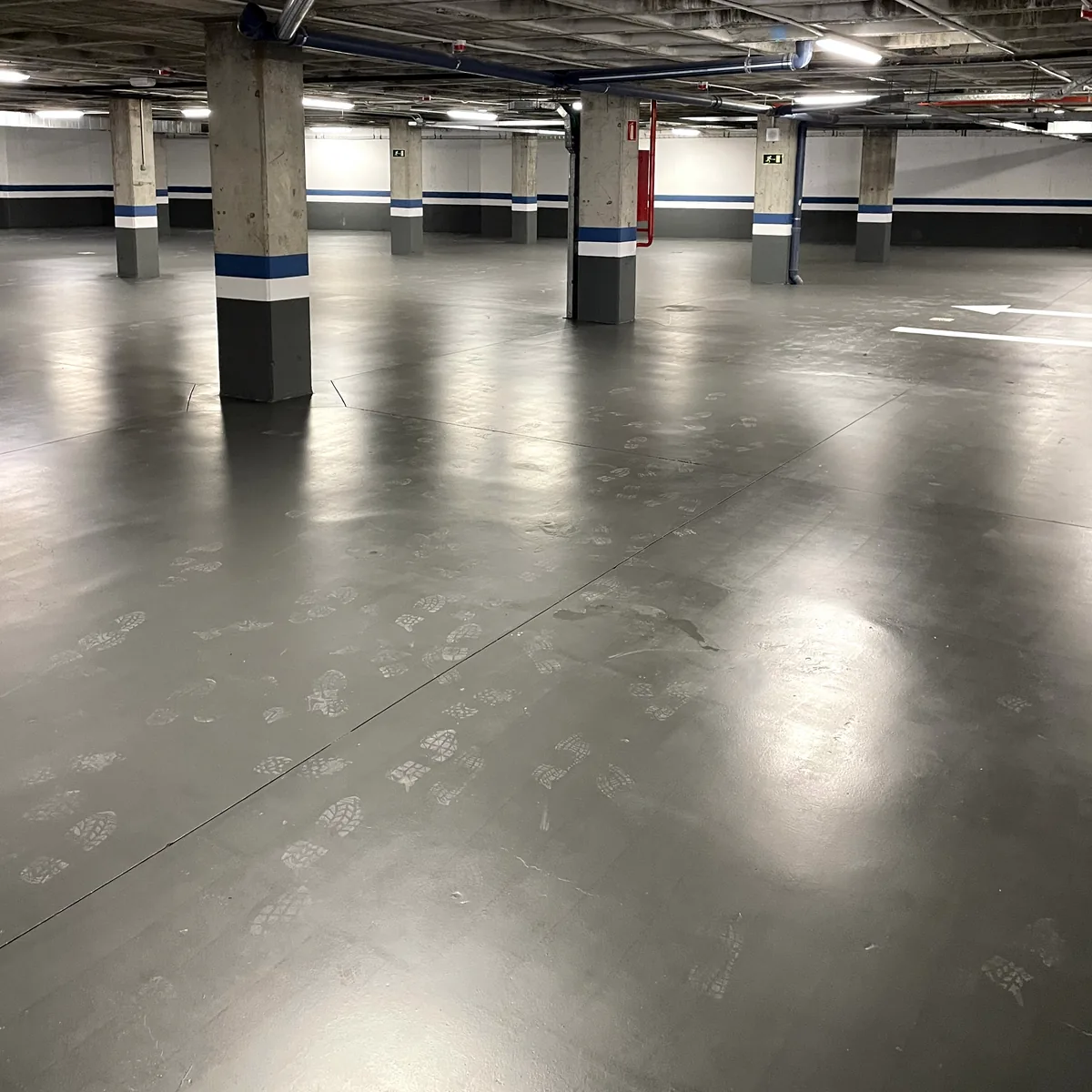 Pillars with blue bands spread across the finished floor Pillars with blue bands spread across the finished floor