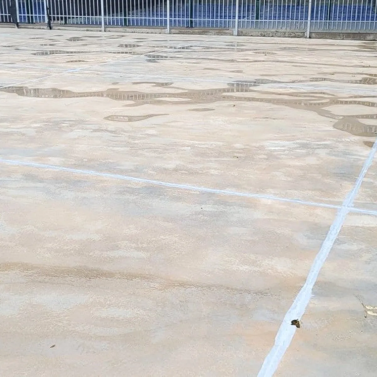 Bare court with faded lines before coating, Cervelló Bare court with faded lines before coating, Cervelló