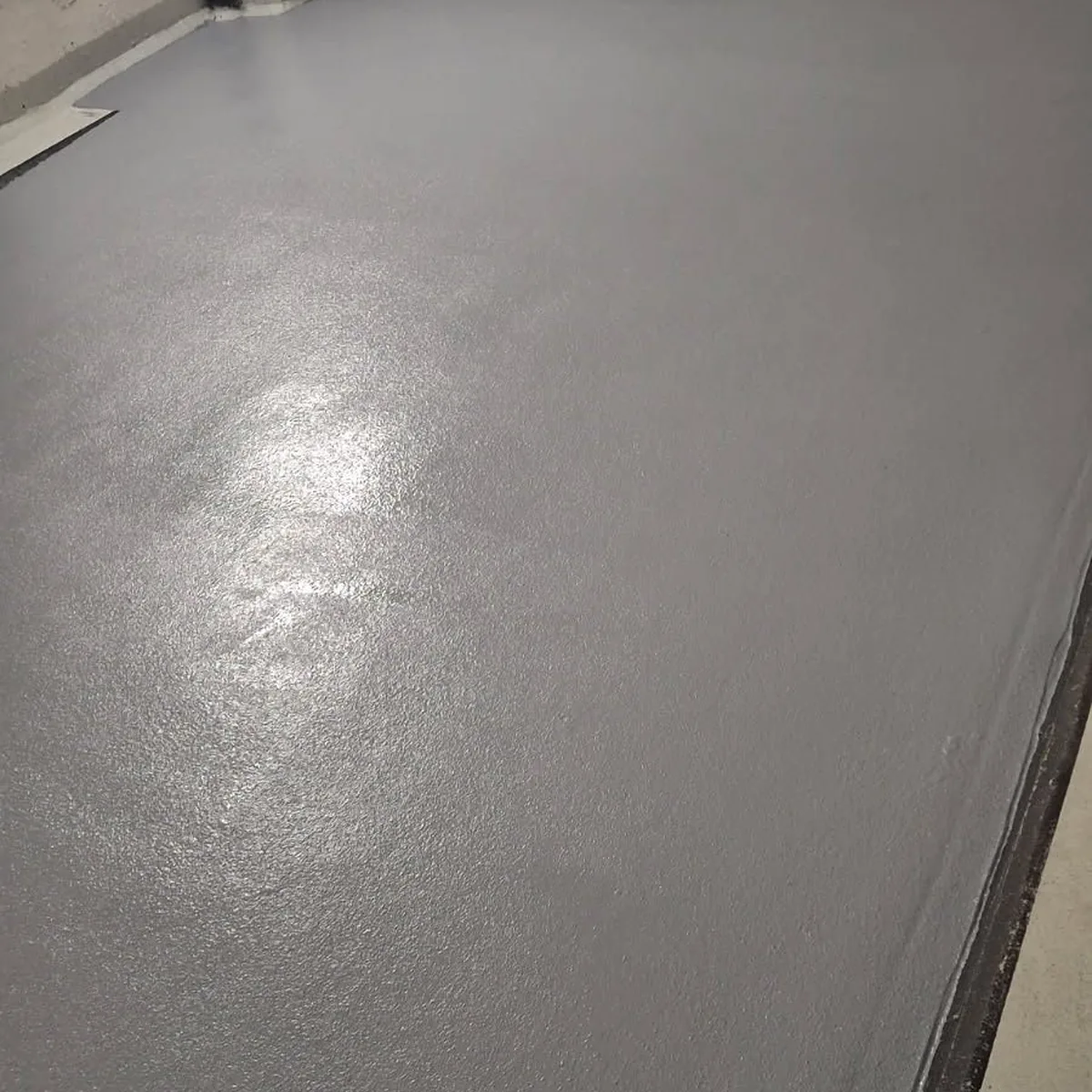 Finished grey ramp surface, close view, Norway Finished grey ramp surface, close view, Norway