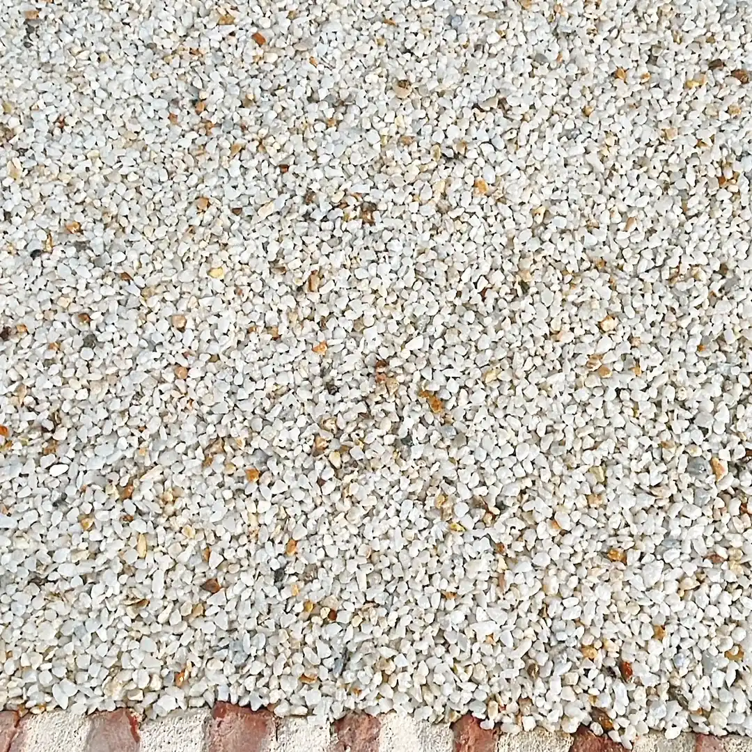 The pale crushed aggregate bound in the garden floor The pale crushed aggregate bound in the garden floor