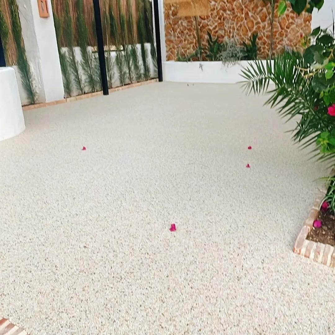 The aggregate terrace with a brick step The aggregate terrace with a brick step