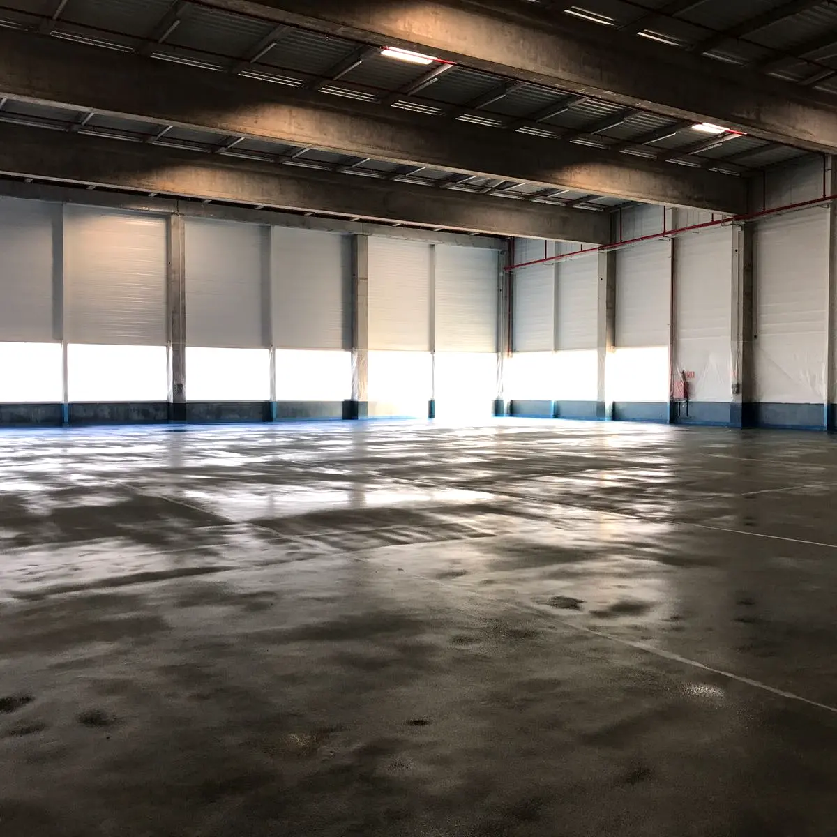 Bare concrete production hall before flooring, Algeria pharma plant