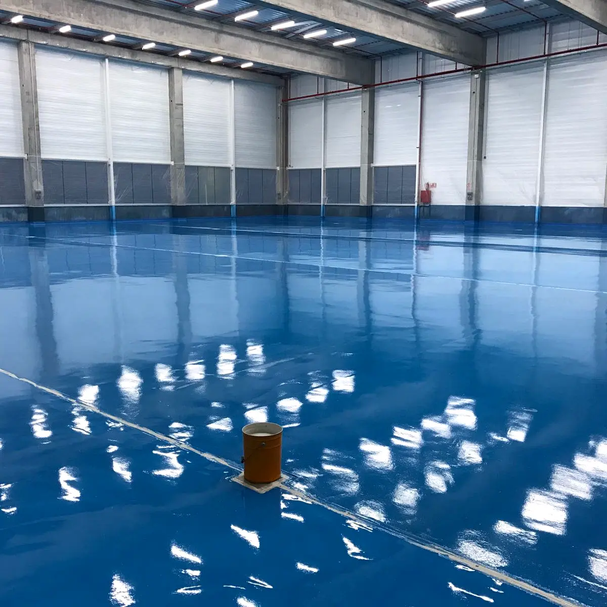 Glossy blue floor reflecting the hall windows, Algeria pharma plant