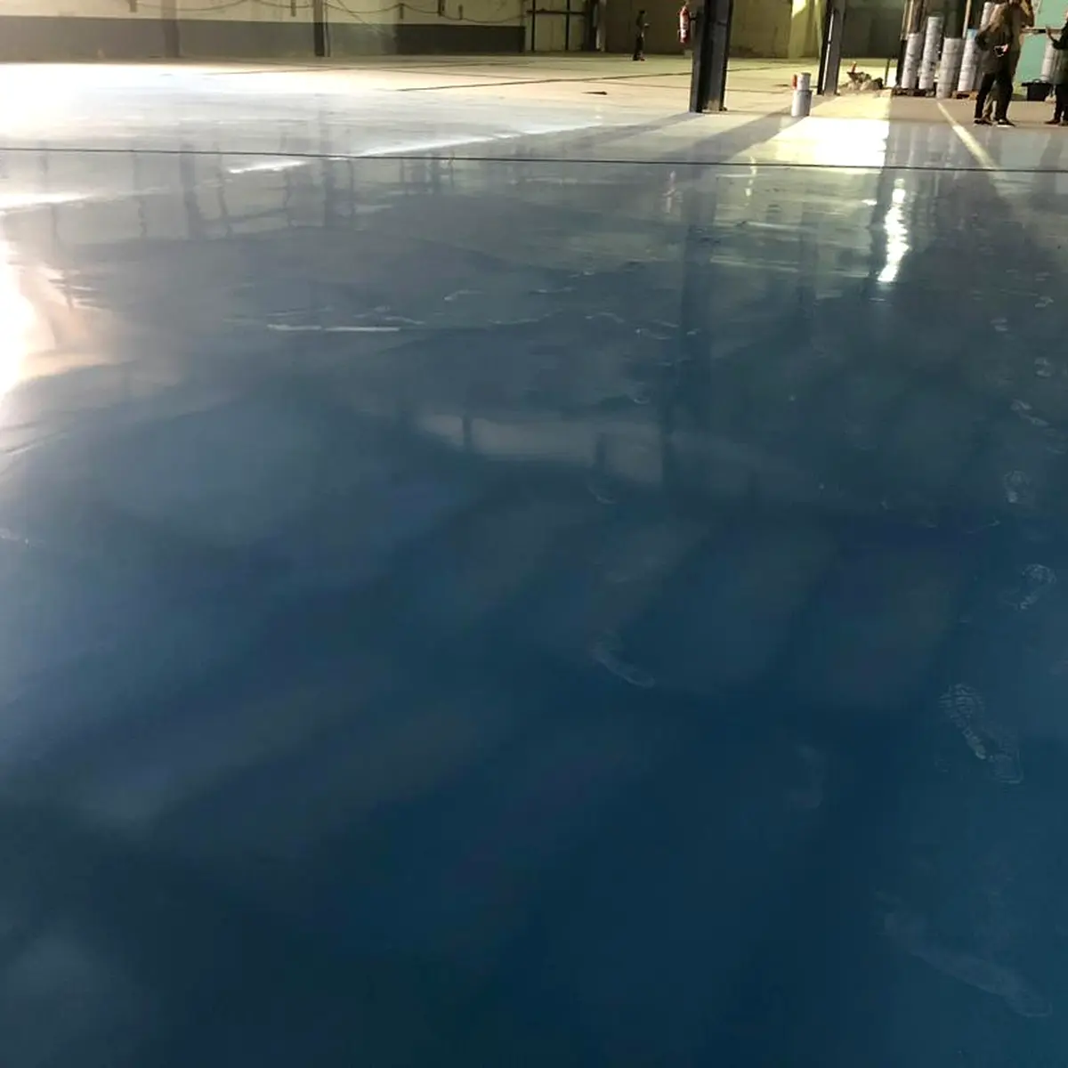 Wide glossy dark blue floor across the hall, Algeria pharma plant