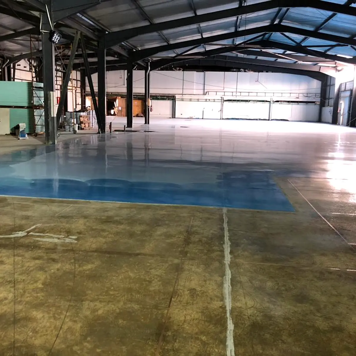 Primed slab with copper tape leading to a blue floor area, Algeria pharma plant