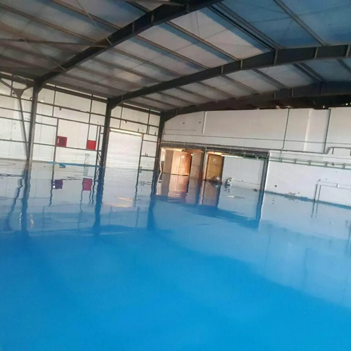 Light blue glossy floor near the loading doors, Algeria pharma plant