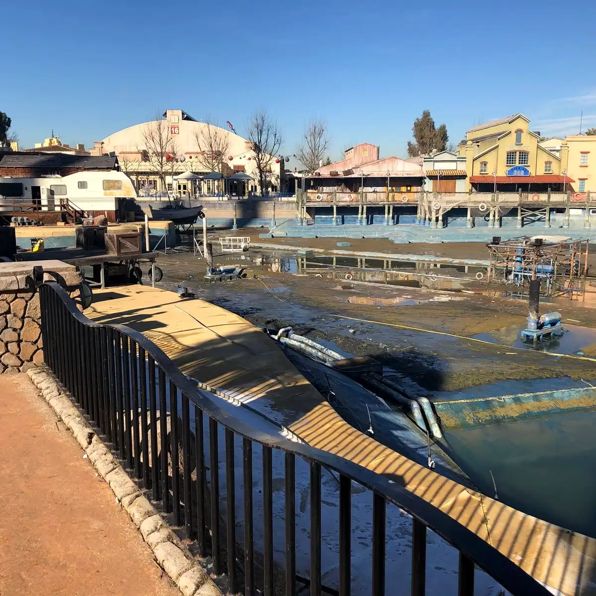 Lake area from the promenade with themed buildings behind, Parque Warner Madrid