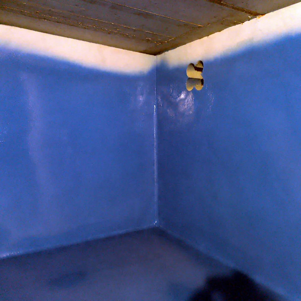Blue Polyurea Rayston water tank lining on the walls and corner, Palma