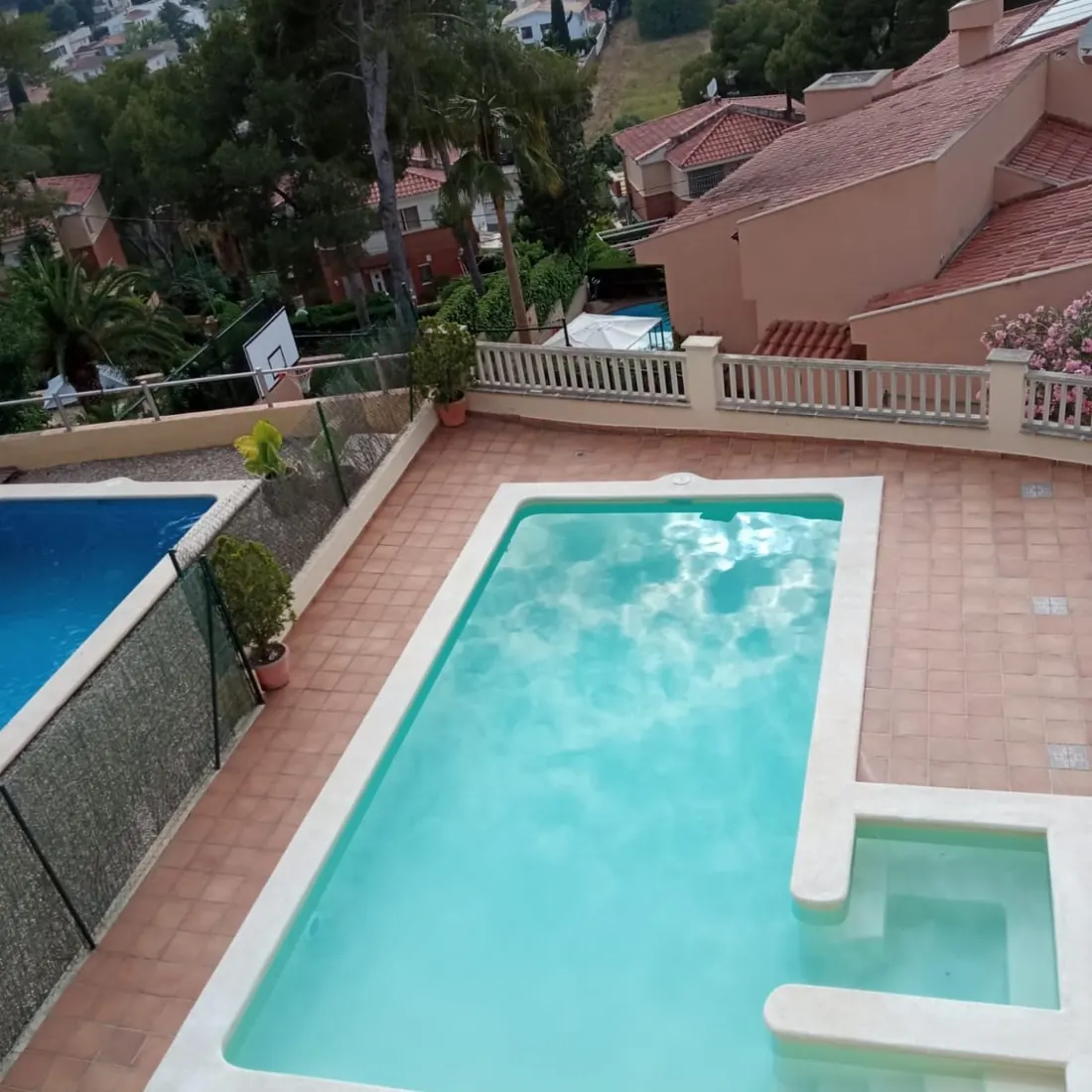 The pool beside the house, seen from the garden The pool beside the house, seen from the garden