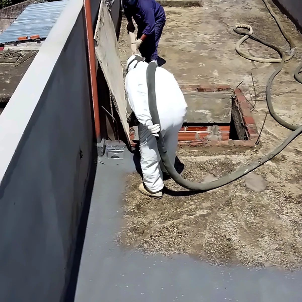 Roof waterproofing Argentina: polyurea sprayed around a roof drain in Buenos Aires