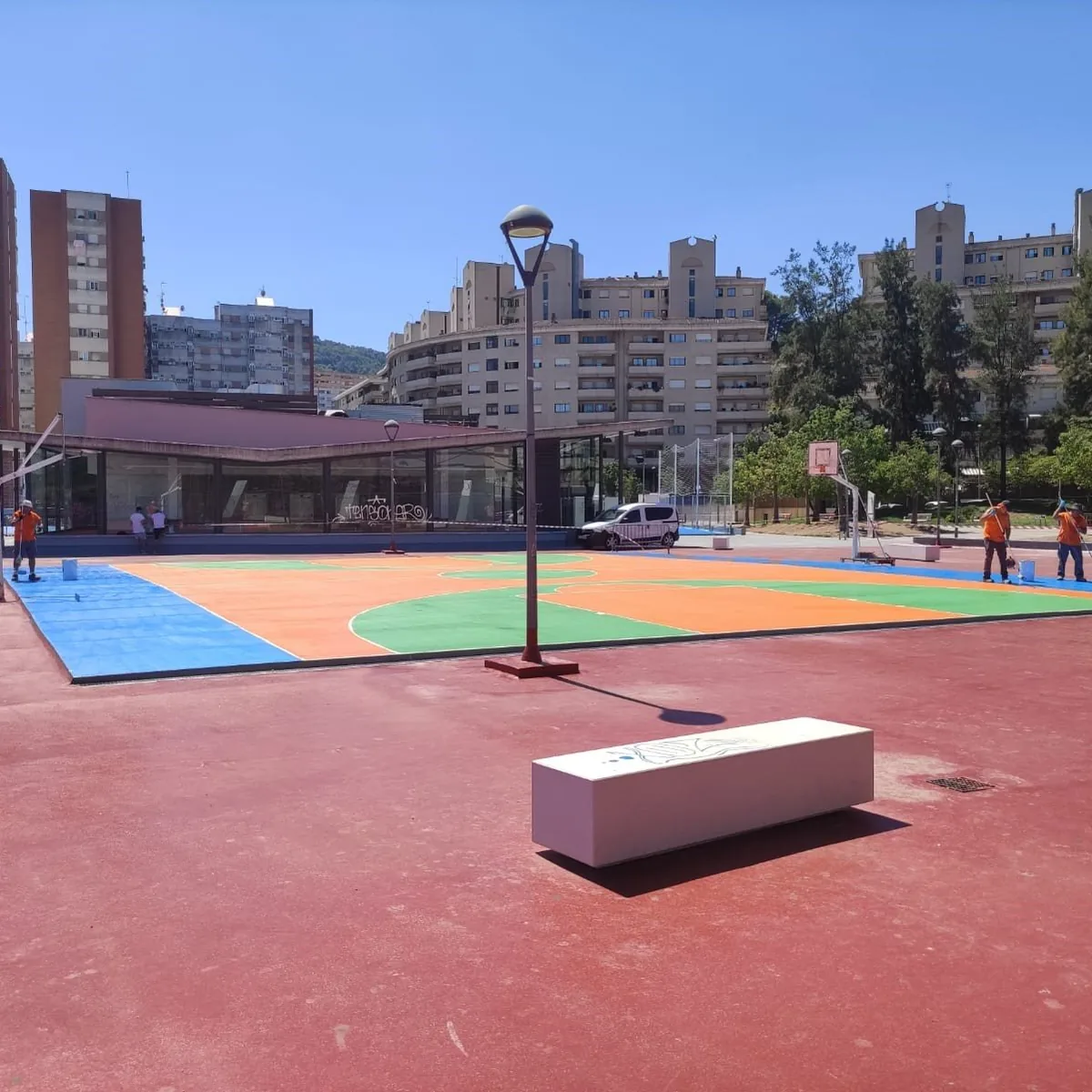 Finished red surround with bench on the rooftop sports area, Barcelona