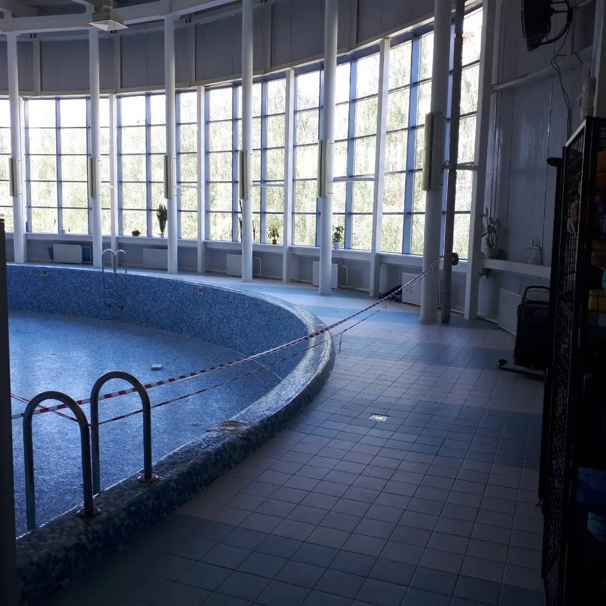 Curved pool with ladder after the works, Russia