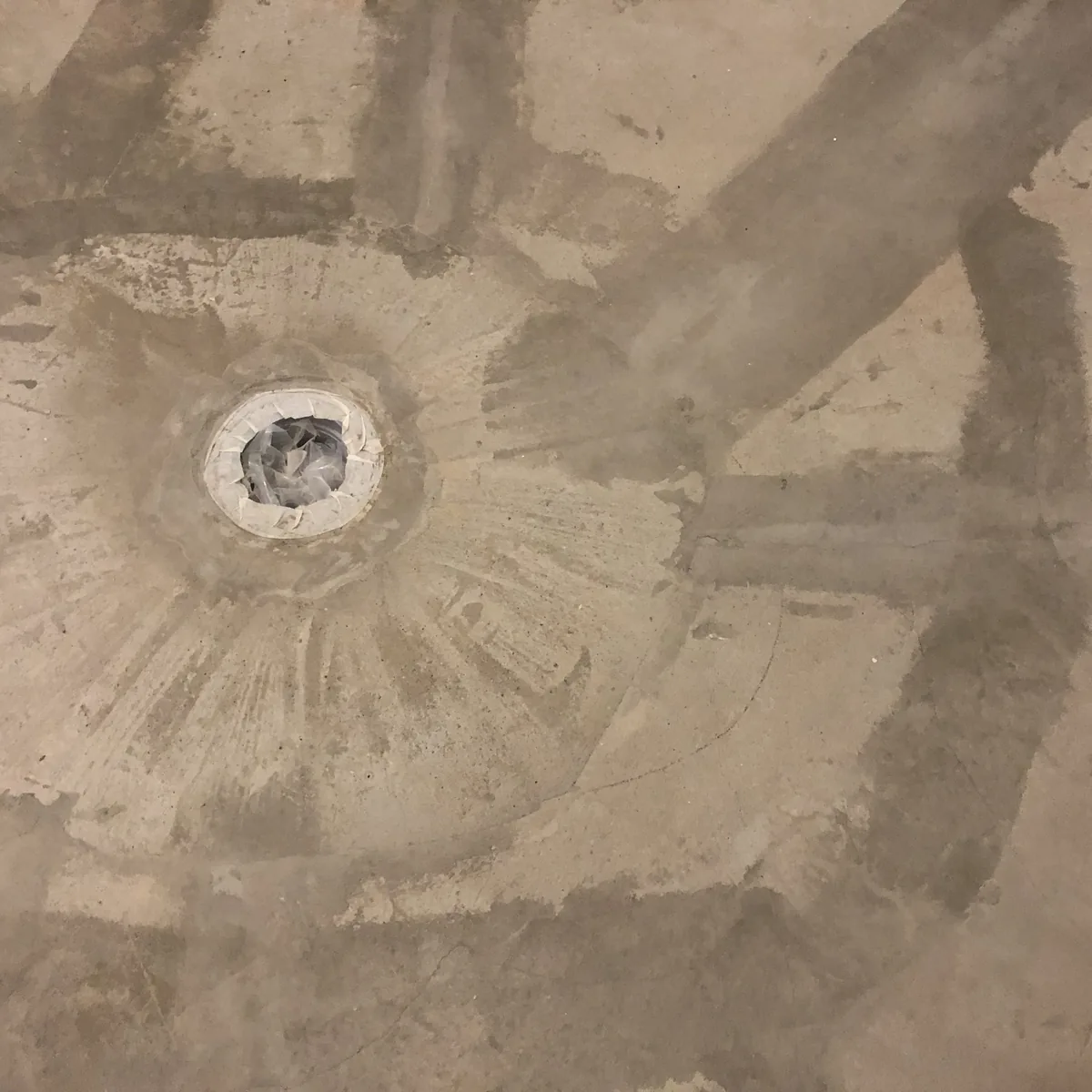 Close view of crack lines around a pool outlet, Nizhny Novgorod