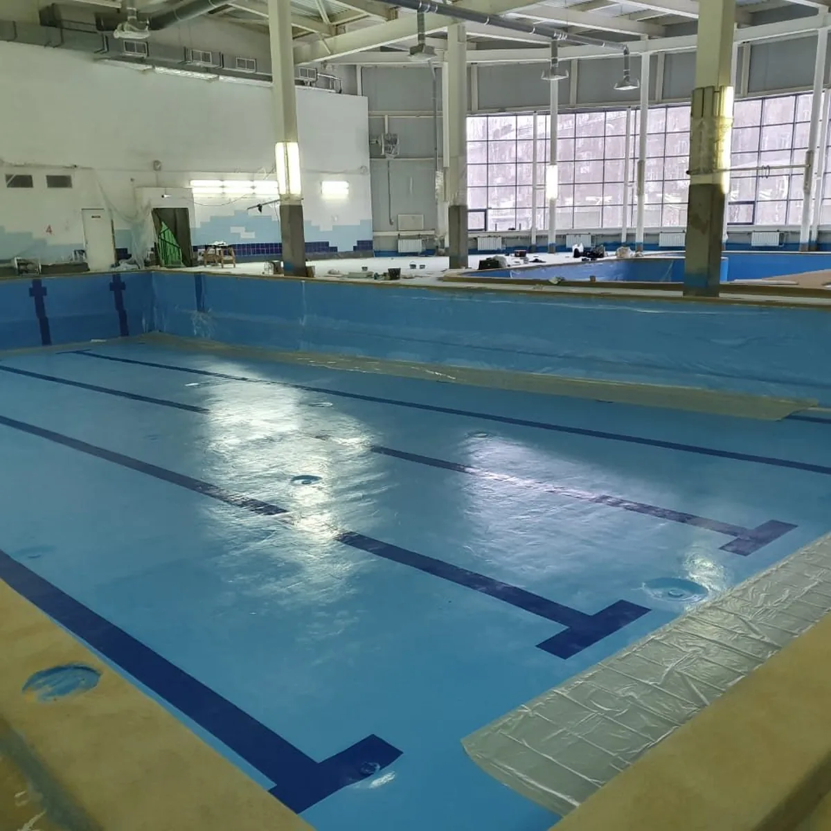 Pool partly refilled with lane markings visible during the works, Nizhny Novgorod