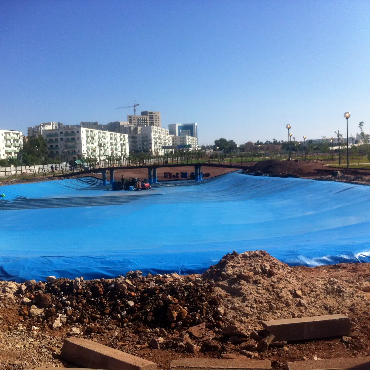 Finished urban lake lining in Algeria seen from the bank