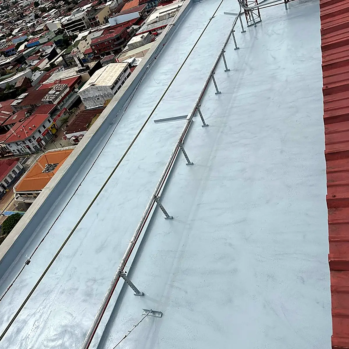 Long coated strip along the building edge Long coated strip along the building edge
