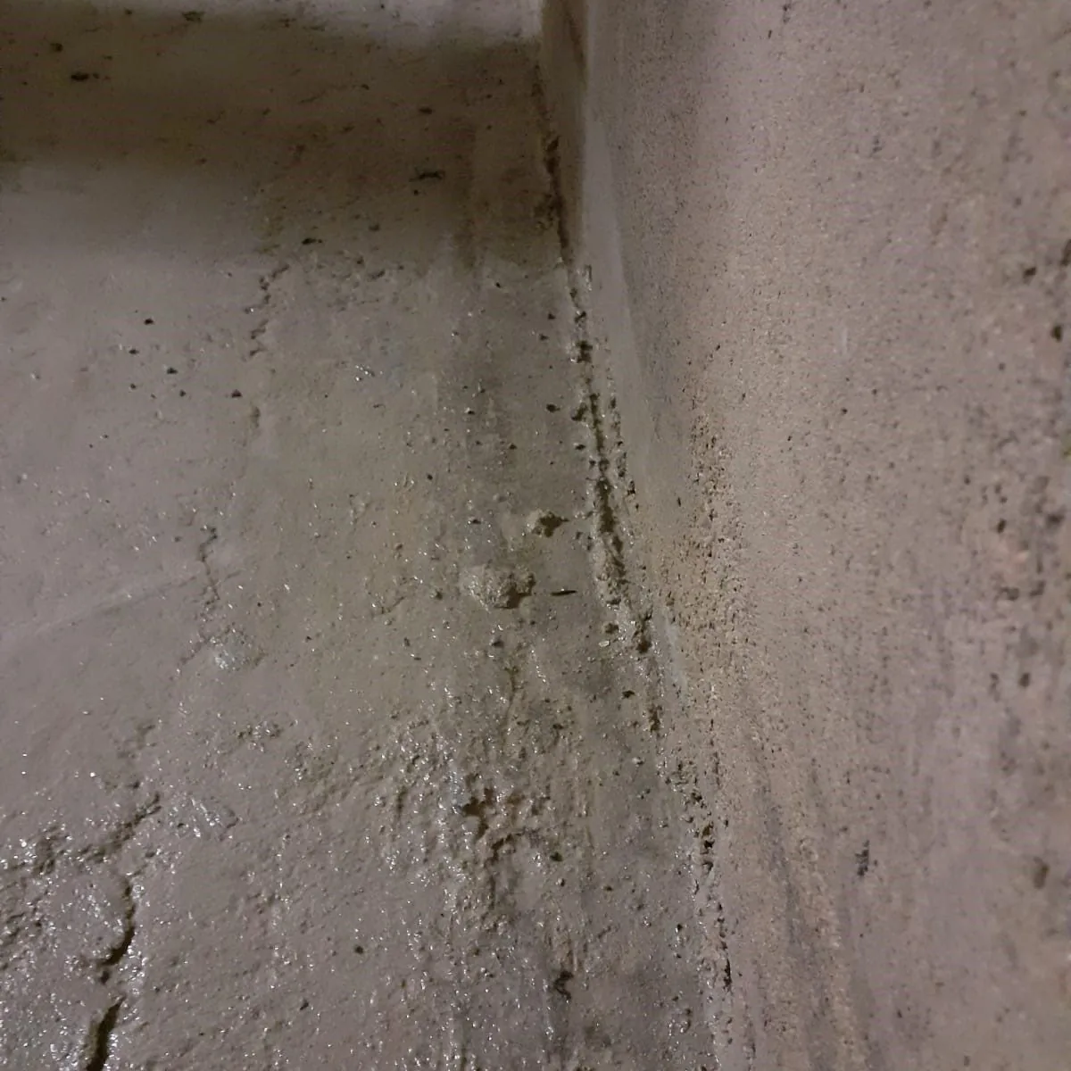 Crack along a tank wall corner before repair, Mallorca