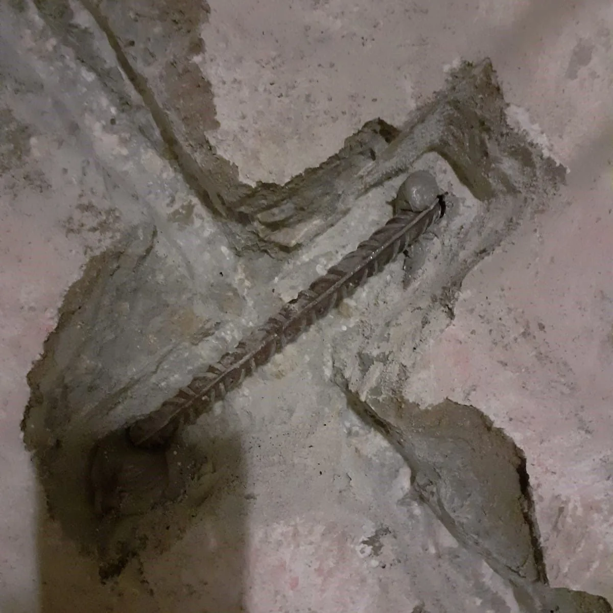 Repaired crack junction on the concrete wall, Mallorca