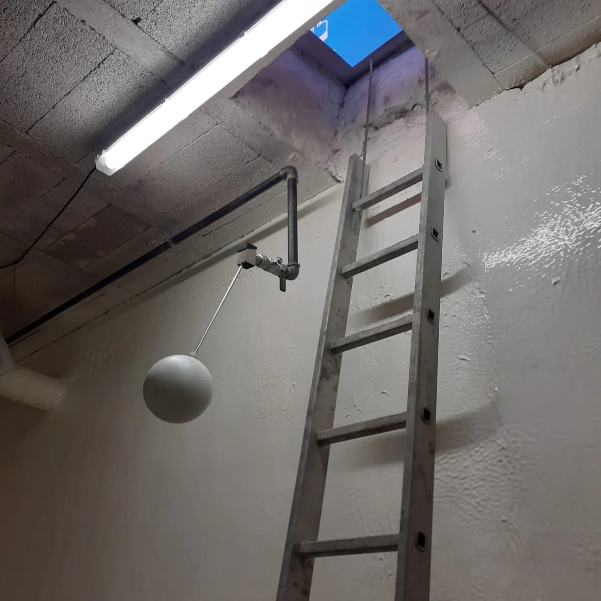 Access ladder against a lined tank wall, Mallorca