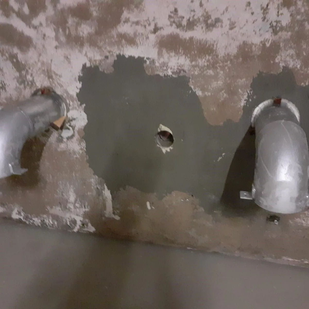 Two pipe penetrations with repaired surrounds, Mallorca tank